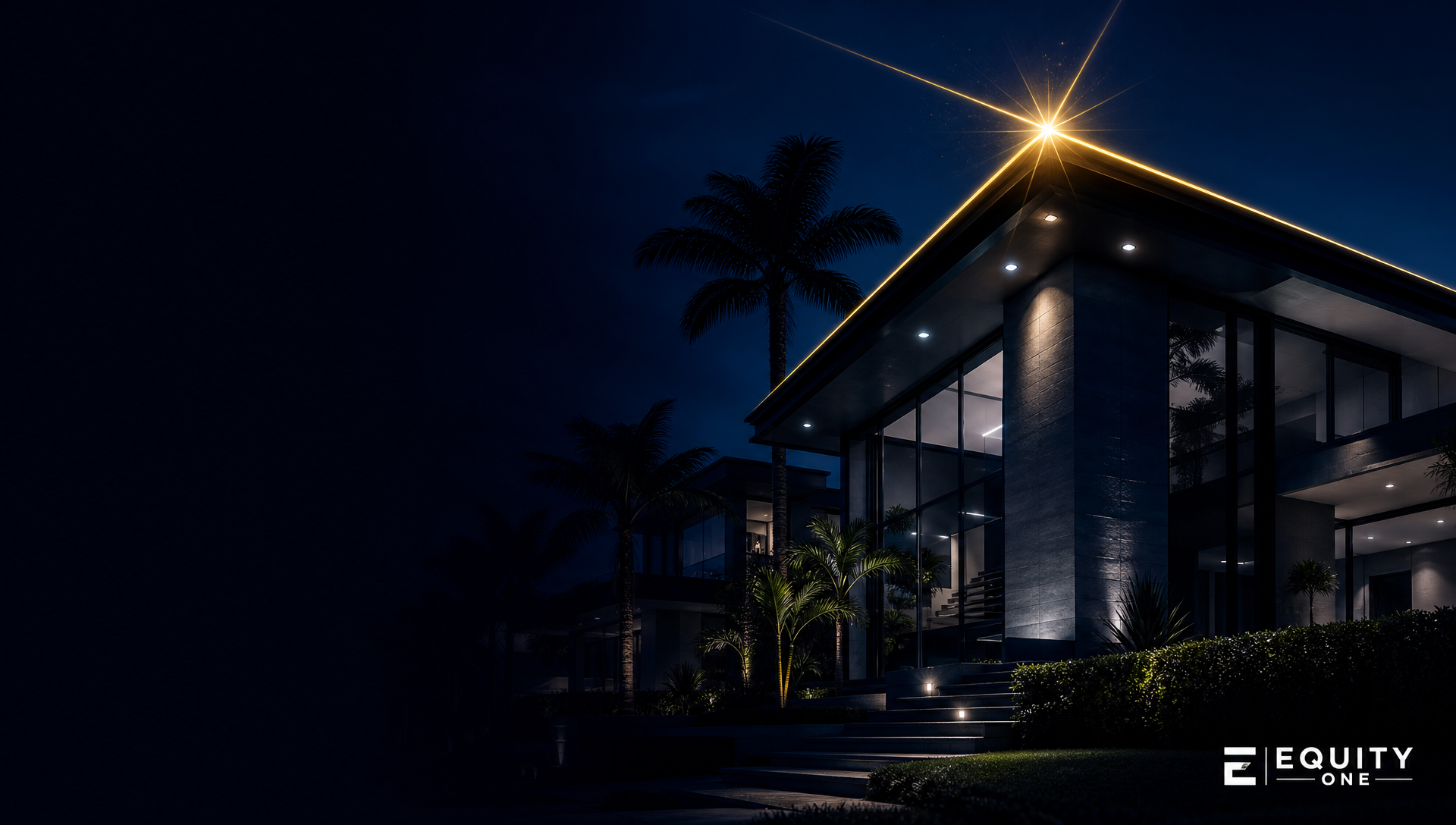 Modern home at night with signature gold roofline